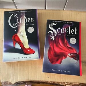 $15 SALE Set of 2 Paperback Teen Fiction Bk Cinder Scarlet Futuristic Fairytale